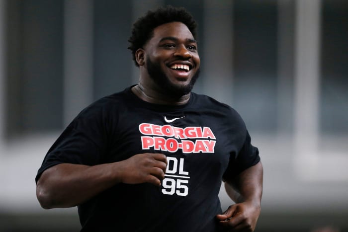Georgia defensive lineman Devonte Wyatt (95) runs a drill during Georgia's Pro Day in Athens, Ga., on Wednesday, March 16, 2022. News Joshua L Jones